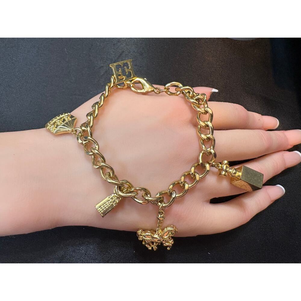 Escada Gold-Tone Carousel Charm Bracelet with Signature E Logo SZ 7.25"